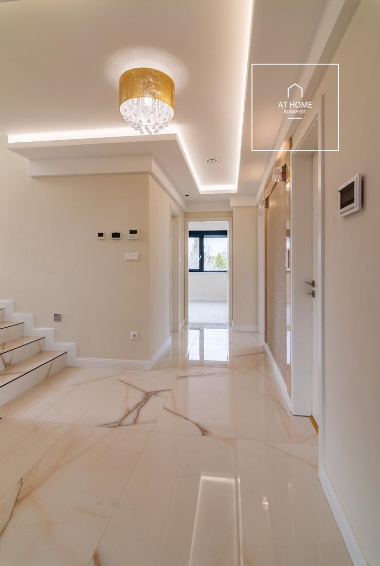 Eladó prémium penthouse lakás panorámás teraszokkal Gazdagréten, Budapesten