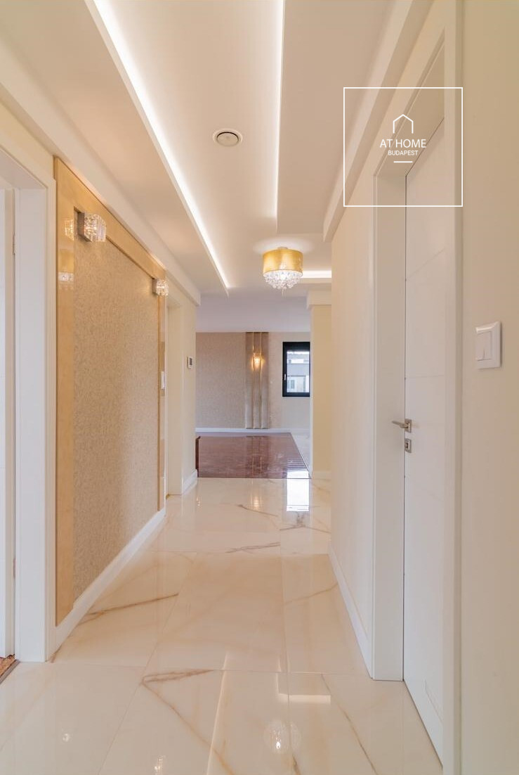 Eladó prémium penthouse lakás panorámás teraszokkal Gazdagréten, Budapesten