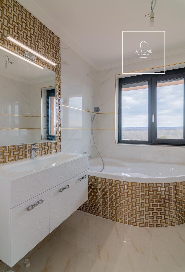 Eladó prémium penthouse lakás panorámás teraszokkal Gazdagréten, Budapesten