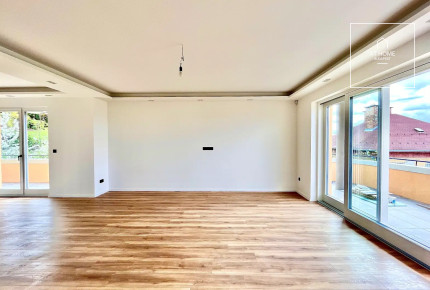 Exclusive three-bedroom apartment with panoramic views for rent in Budapest\'s 11th District.