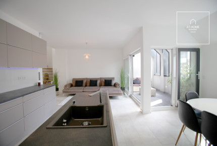 A luxury duplex penthouse apartment is available for rent in the 6th district of Budapest, Terézváros.