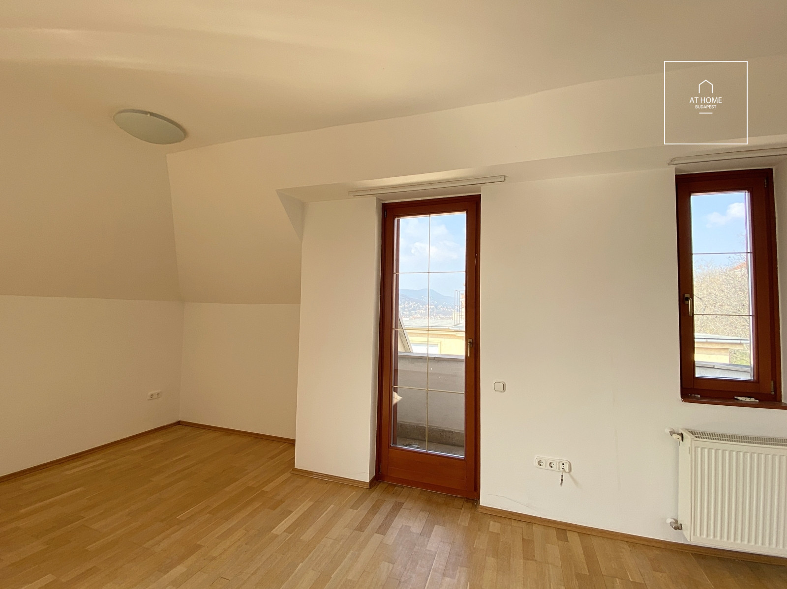 Spacious 82 sqm attic apartment with two bedrooms and terraces offering panoramic views in Budapest’s 1st district