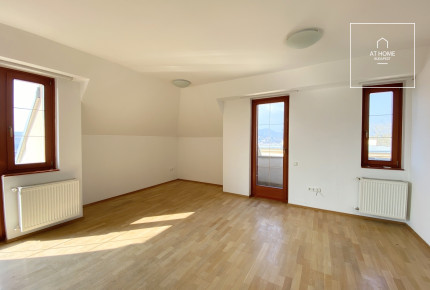 Spacious 82 sqm attic apartment with two bedrooms and terraces offering panoramic views in Budapest’s 1st district