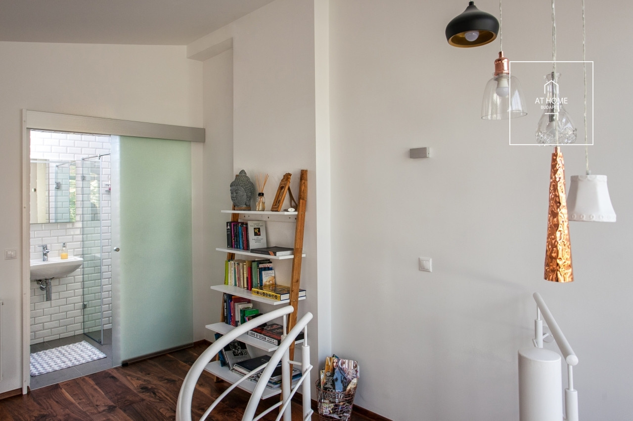 Two-storey apartment with private rooftop terrace and dedicated parking space for sale in District VI