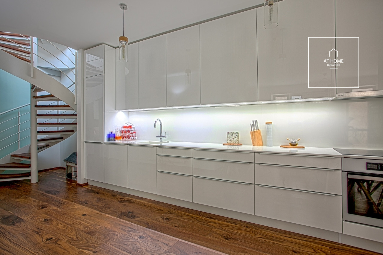 Two-storey apartment with private rooftop terrace and dedicated parking space for sale in District VI