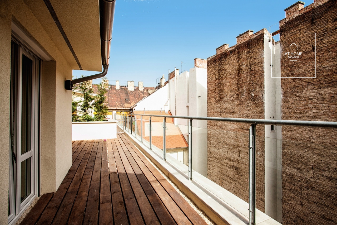 Two-storey apartment with private rooftop terrace and dedicated parking space for sale in District VI