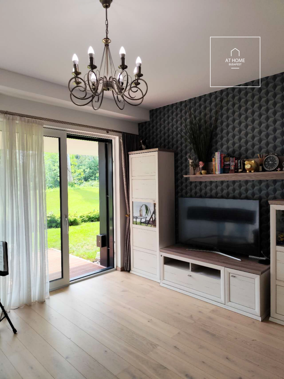 Modern ground-floor apartment with a 20 m² terrace and garden access in District XII