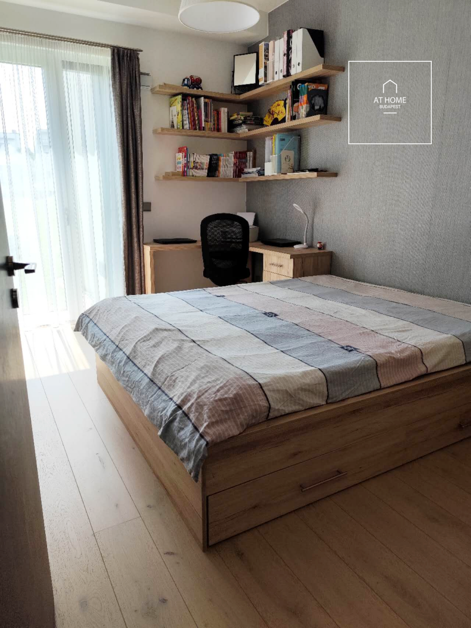 Modern ground-floor apartment with a 20 m² terrace and garden access in District XII