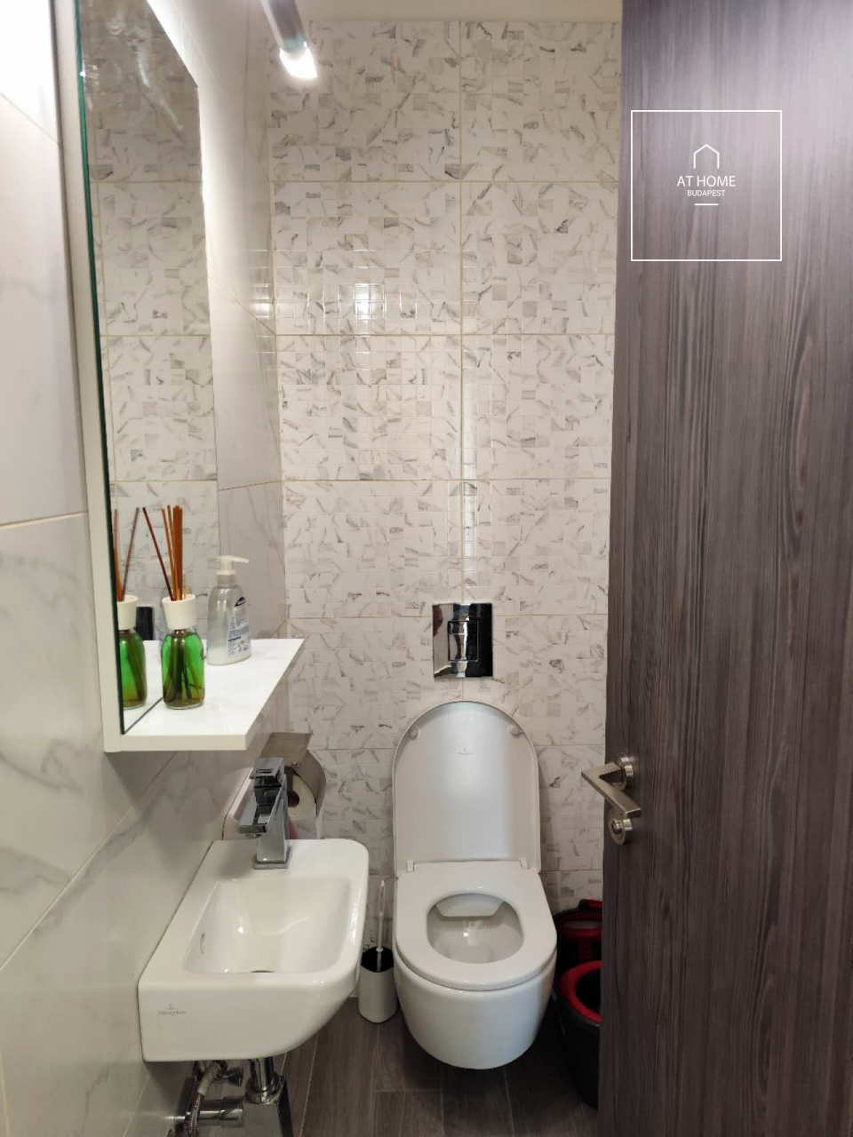 Modern ground-floor apartment with a 20 m² terrace and garden access in District XII