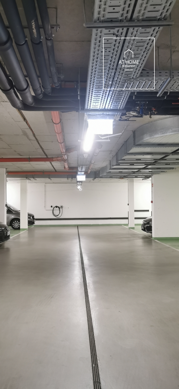 Modern ground-floor apartment with a 20 m² terrace and garden access in District XII