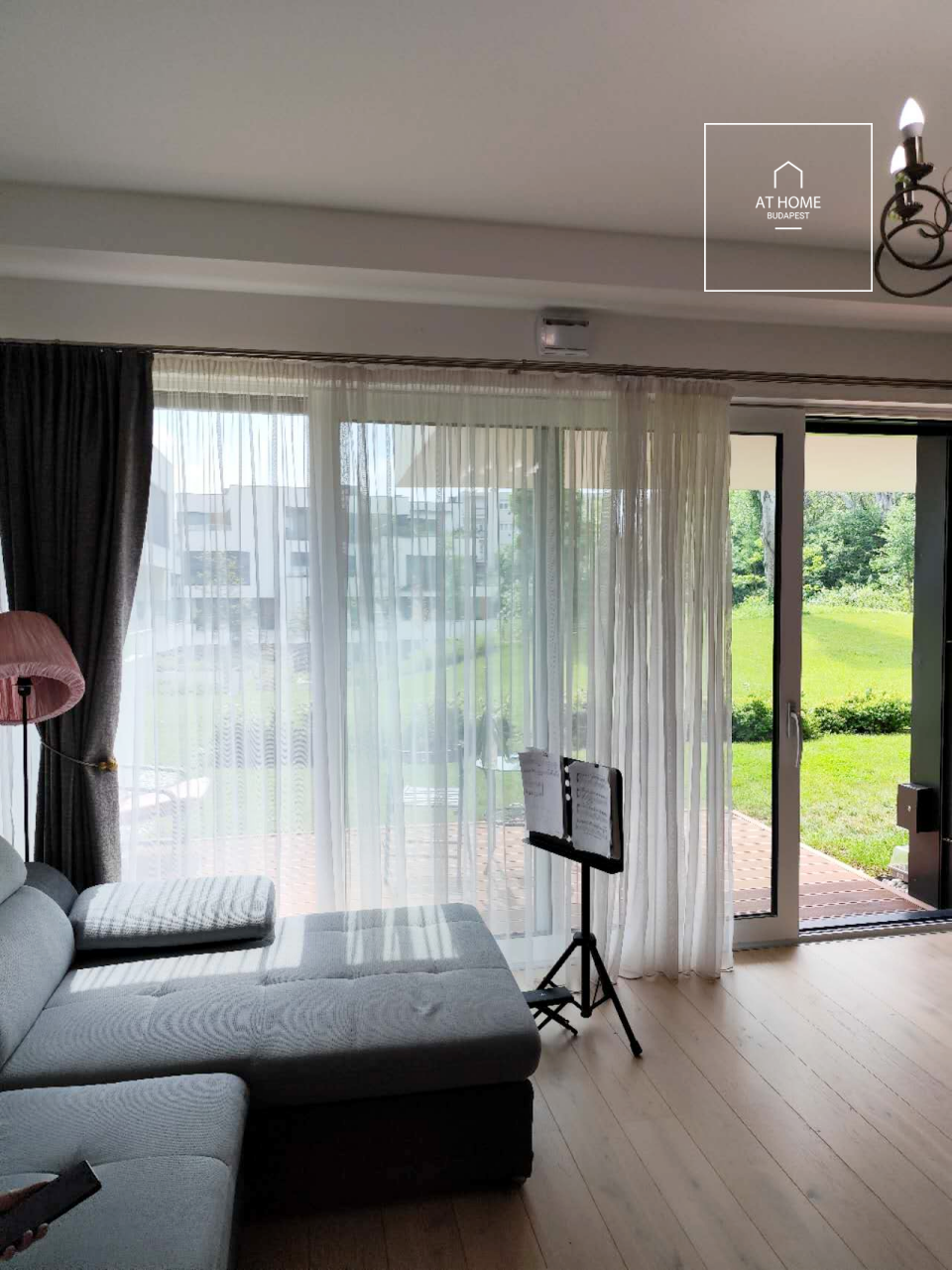 Modern ground-floor apartment with a 20 m² terrace and garden access in District XII