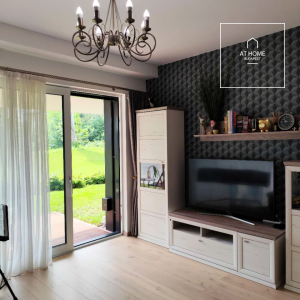 Modern ground-floor apartment with a 20 m² terrace and garden access in District XII