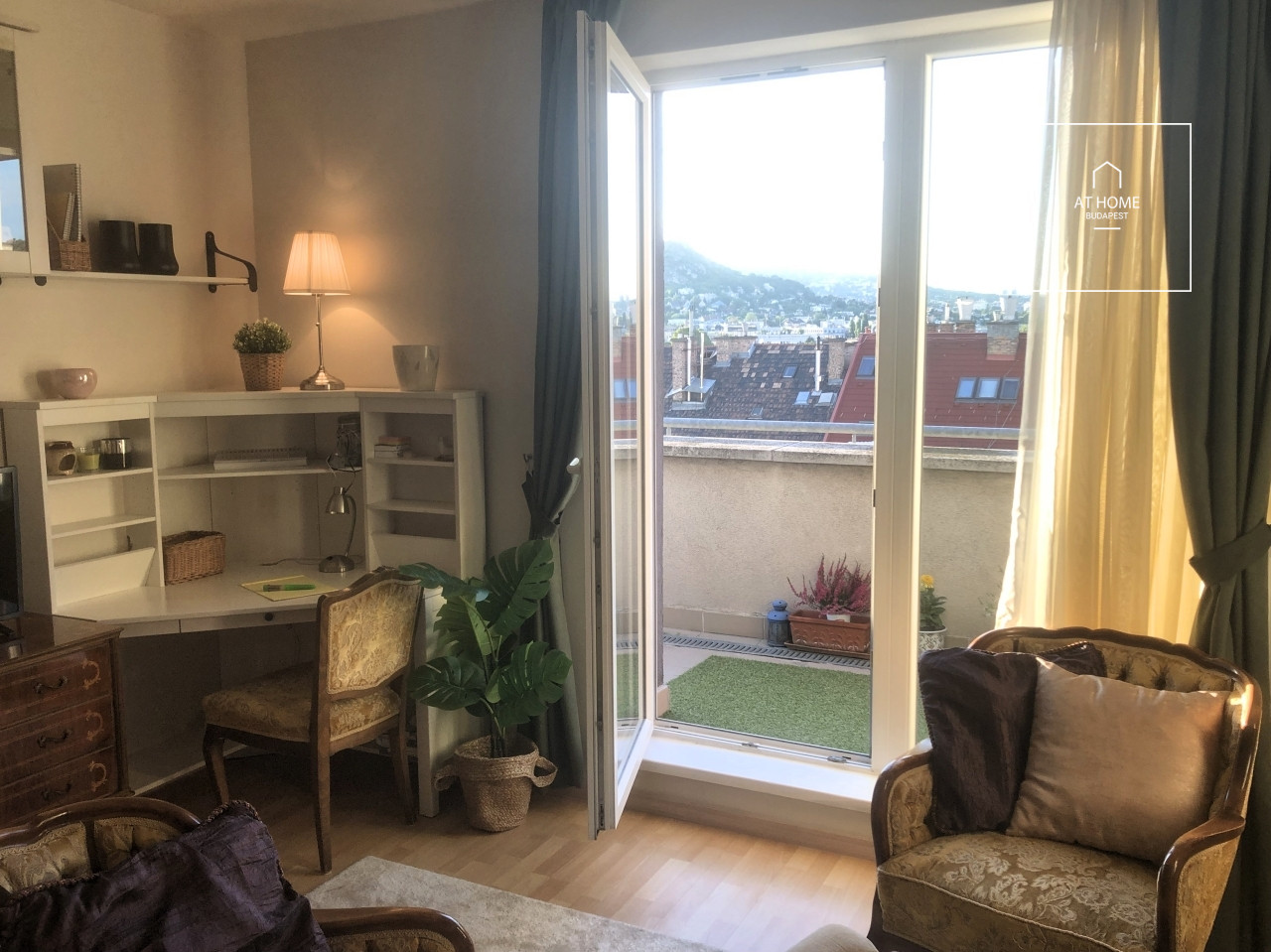 Top-Floor Apartment with Panoramic Views and 25 m² Terrace in District XI