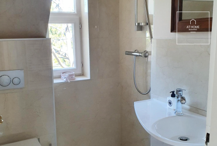 Renovated 152 sqm duplex apartment with a terrace in a private setting in District XII