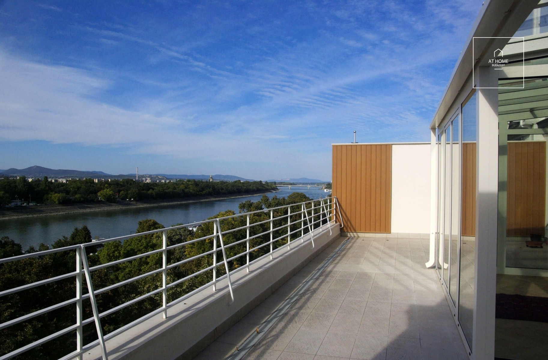 Panoramic two-bedroom penthouse with winter garden and concierge  services in District 13