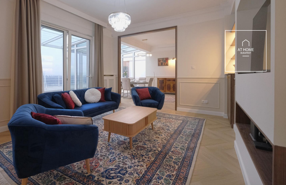 Panoramic two-bedroom penthouse with winter garden and concierge  services in District 13