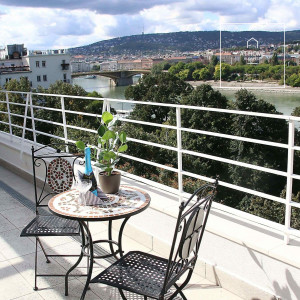 Panoramic two-bedroom penthouse with winter garden and concierge  services in District 13