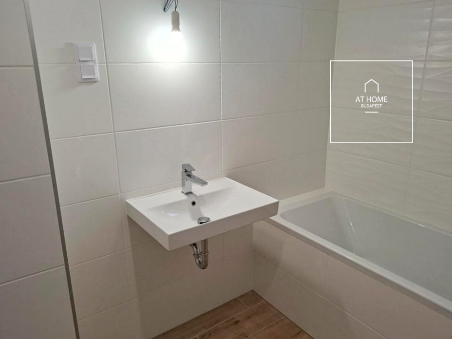 Newly built 3-bedroom apartment with two parking spaces and an electric charger in District 13