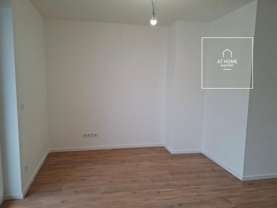 Newly built 3-bedroom apartment with two parking spaces and an electric charger in District 13