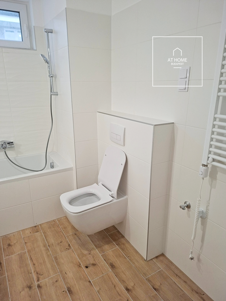 Newly built 3-bedroom apartment with two parking spaces and an electric charger in District 13