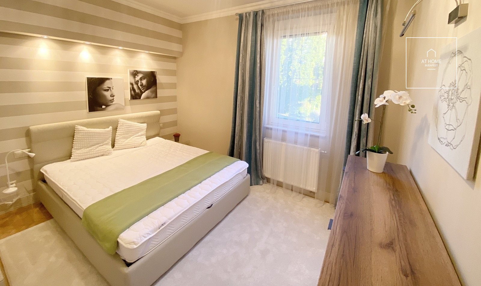 Exclusive, renovated 2-bedroom apartment with a terrace and garage in District II