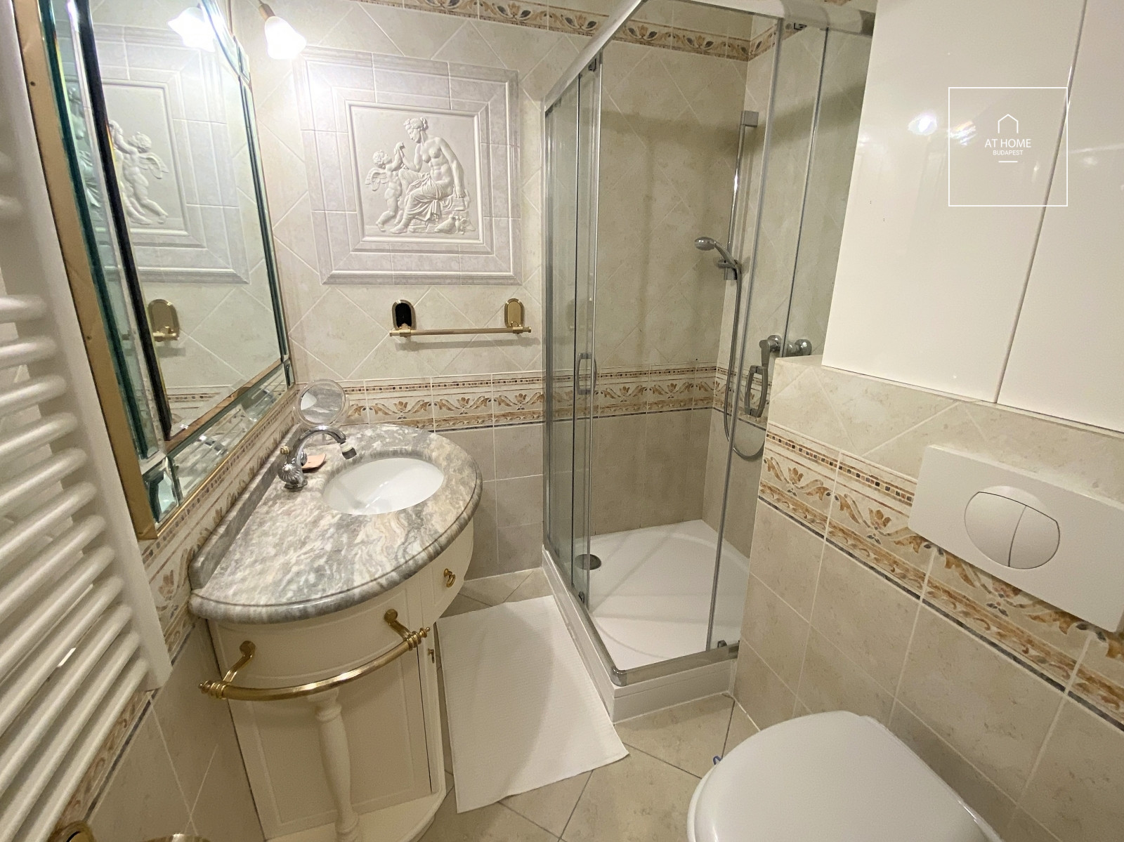 Exclusive, renovated 2-bedroom apartment with a terrace and garage in District II