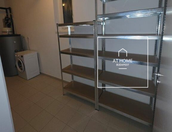 A renovated 97 sqm three-story apartment with a rooftop terrace, located in the 3rd district