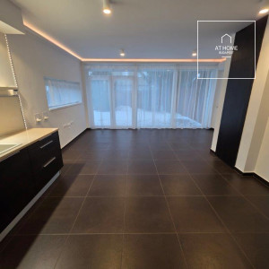 A renovated 97 sqm three-story apartment with a rooftop terrace, located in the 3rd district