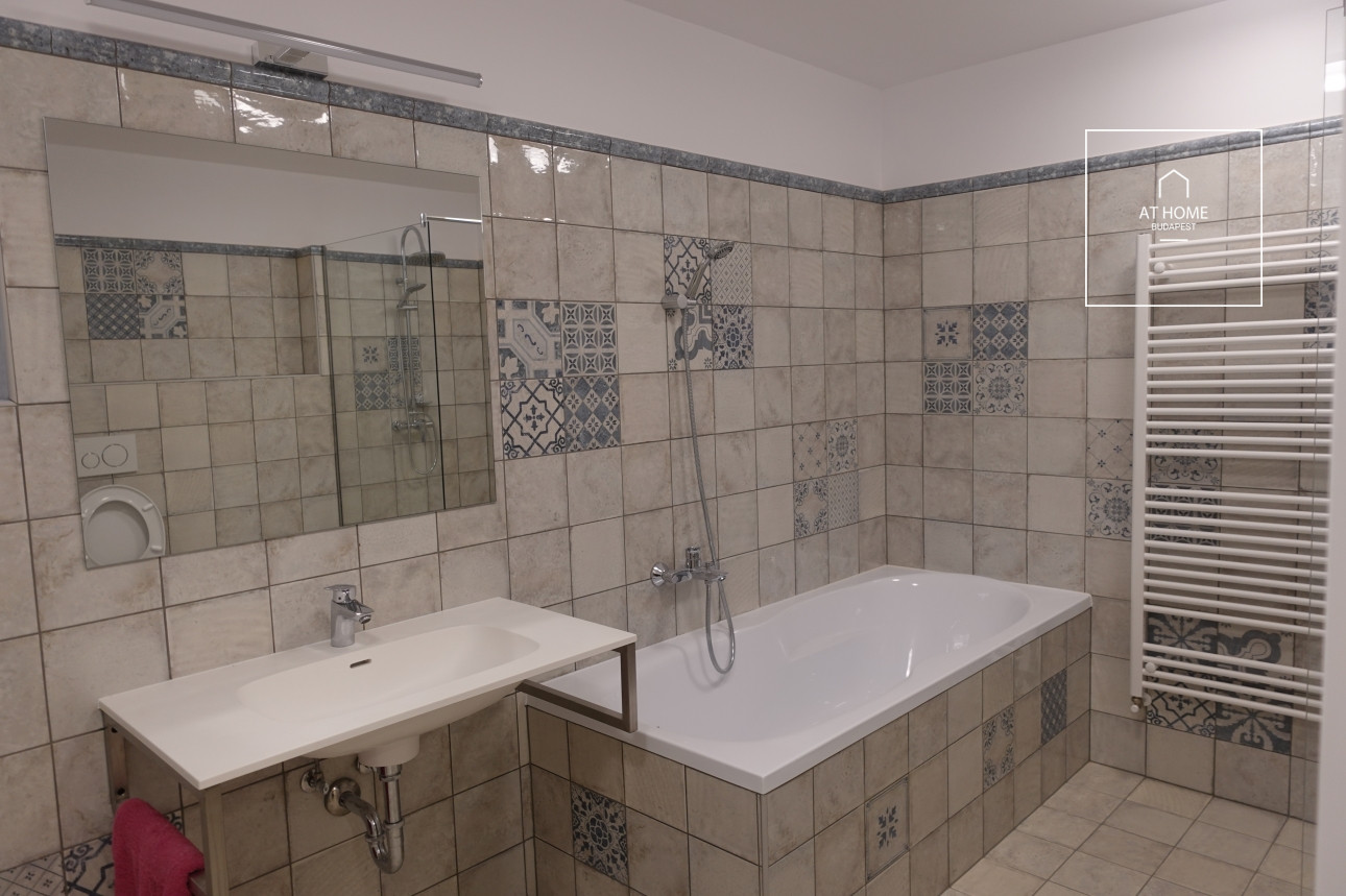 Luxury apartment with 3 bedrooms, a terrace, and a private garden in District XII