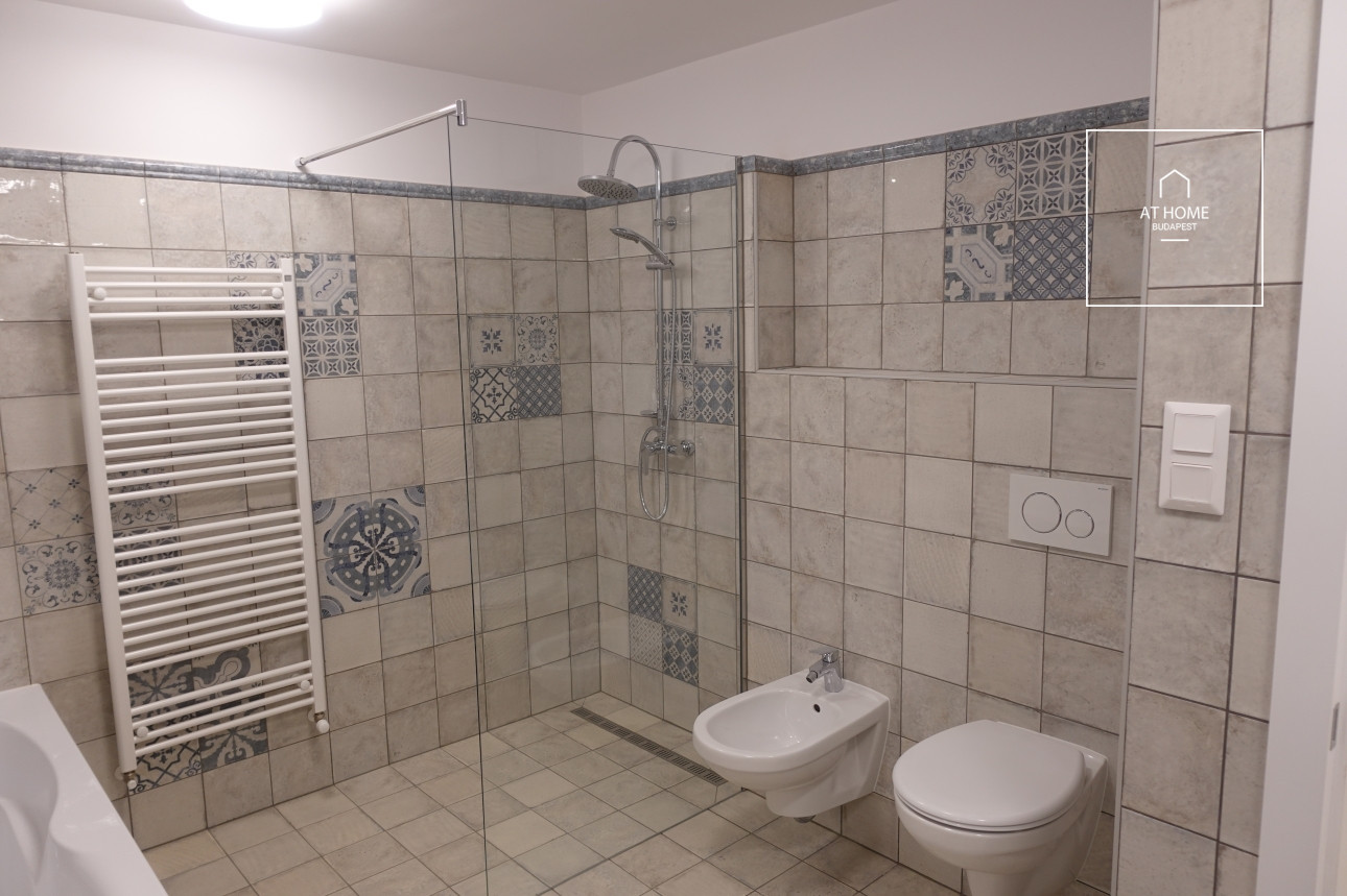 Luxury apartment with 3 bedrooms, a terrace, and a private garden in District XII