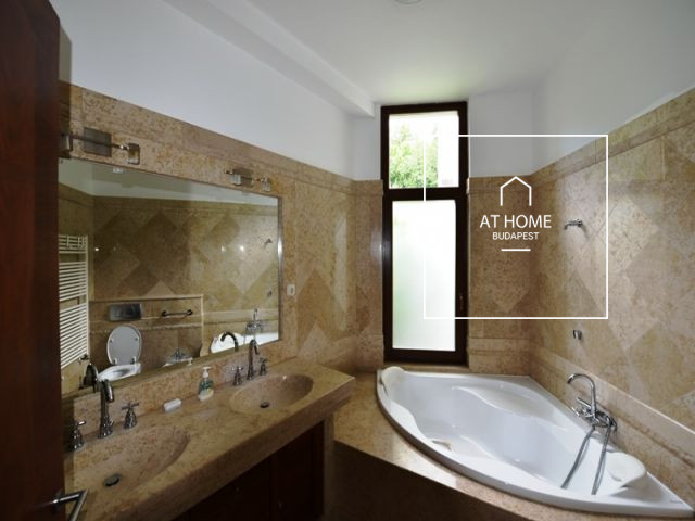 Ground-floor, 150 sqm luxury apartment with garden access in a residential complex in District XII