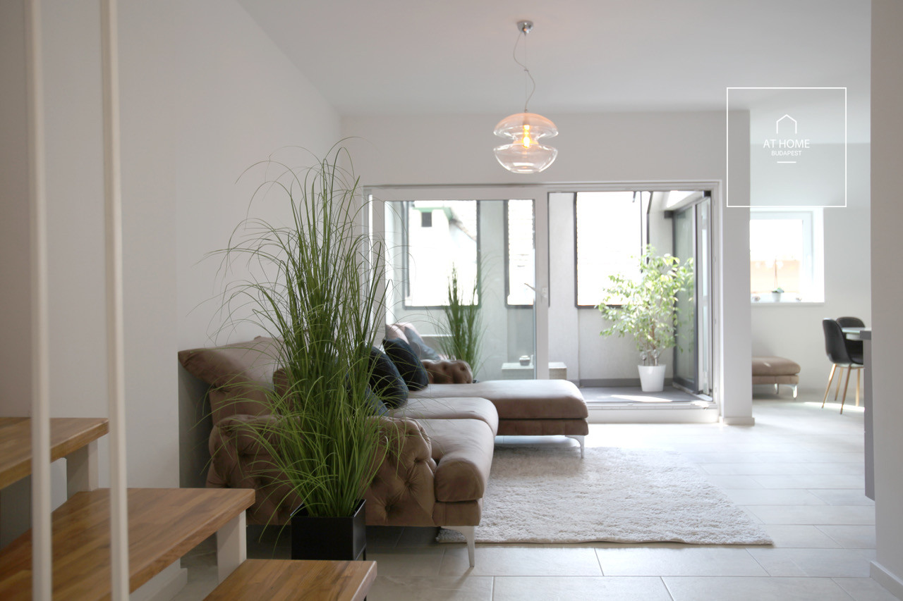 A luxury duplex penthouse apartment is available for rent in the 6th district of Budapest, Terézváros.