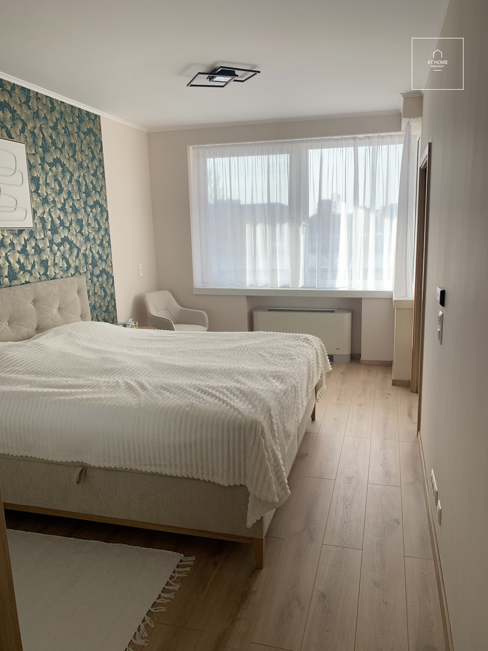 Renovated two-bedroom luxury apartment with a 15 m² panoramic balcony in District IX