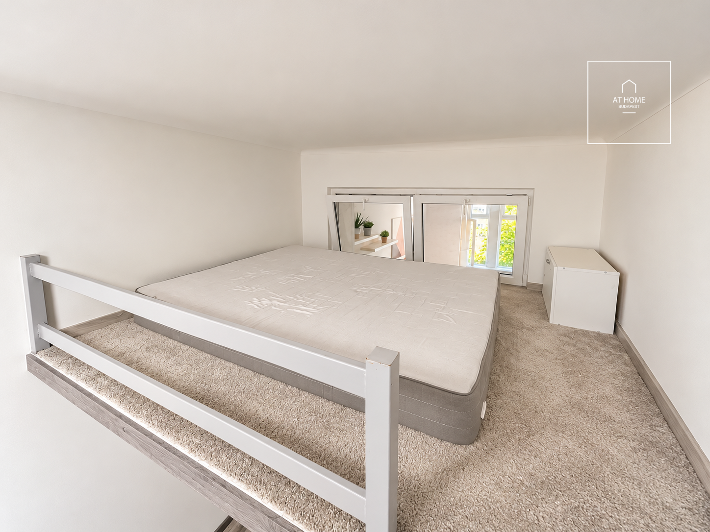 Renovated apartment with a gallery for sale in Krisztinaváros, Budapest.