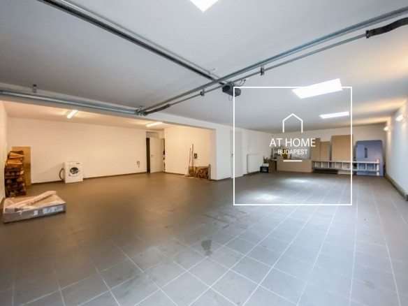 Renovated Three-Storey Family House with a 600 sqm Garden and Four-Car Garage in District III