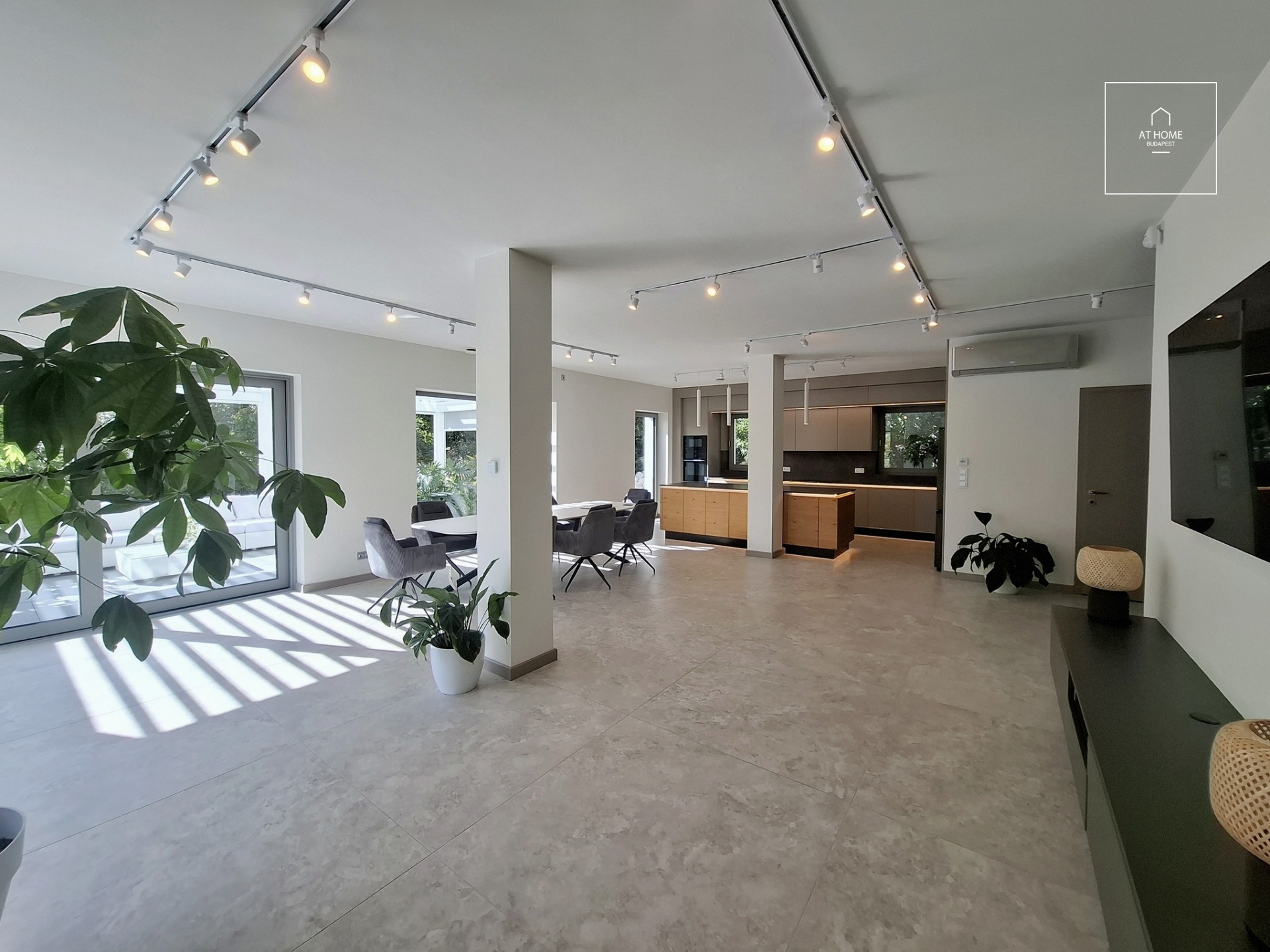 NEW-BUILD, ENERGY-EFFICIENT FAMILY HOME WITH A FOUR-CAR GARAGE, BORDERING NATURE
