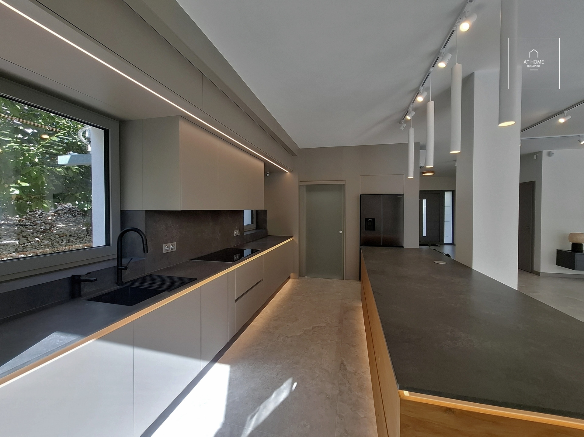 NEW-BUILD, ENERGY-EFFICIENT FAMILY HOME WITH A FOUR-CAR GARAGE, BORDERING NATURE