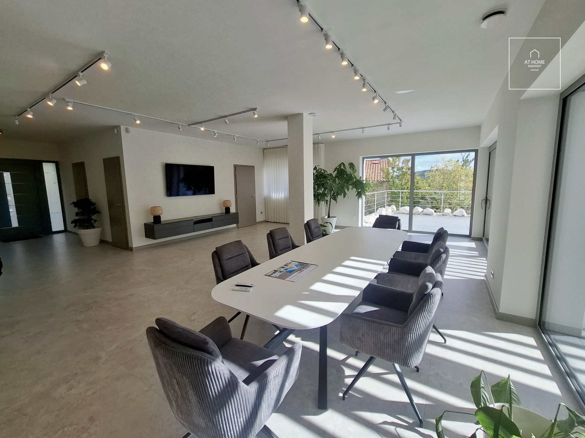NEW-BUILD, ENERGY-EFFICIENT FAMILY HOME WITH A FOUR-CAR GARAGE, BORDERING NATURE
