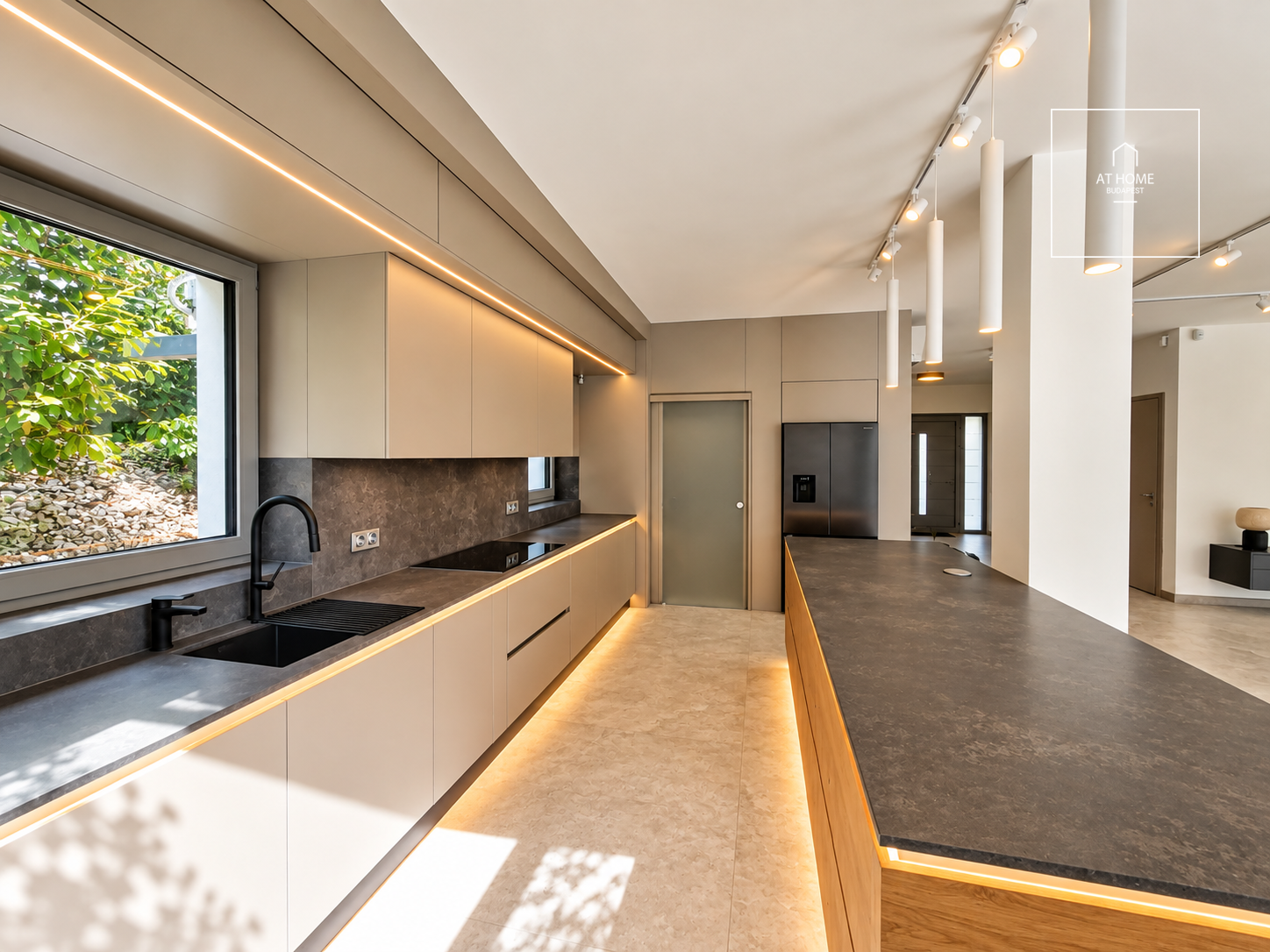 NEW-BUILD, ENERGY-EFFICIENT FAMILY HOME WITH A FOUR-CAR GARAGE, BORDERING NATURE