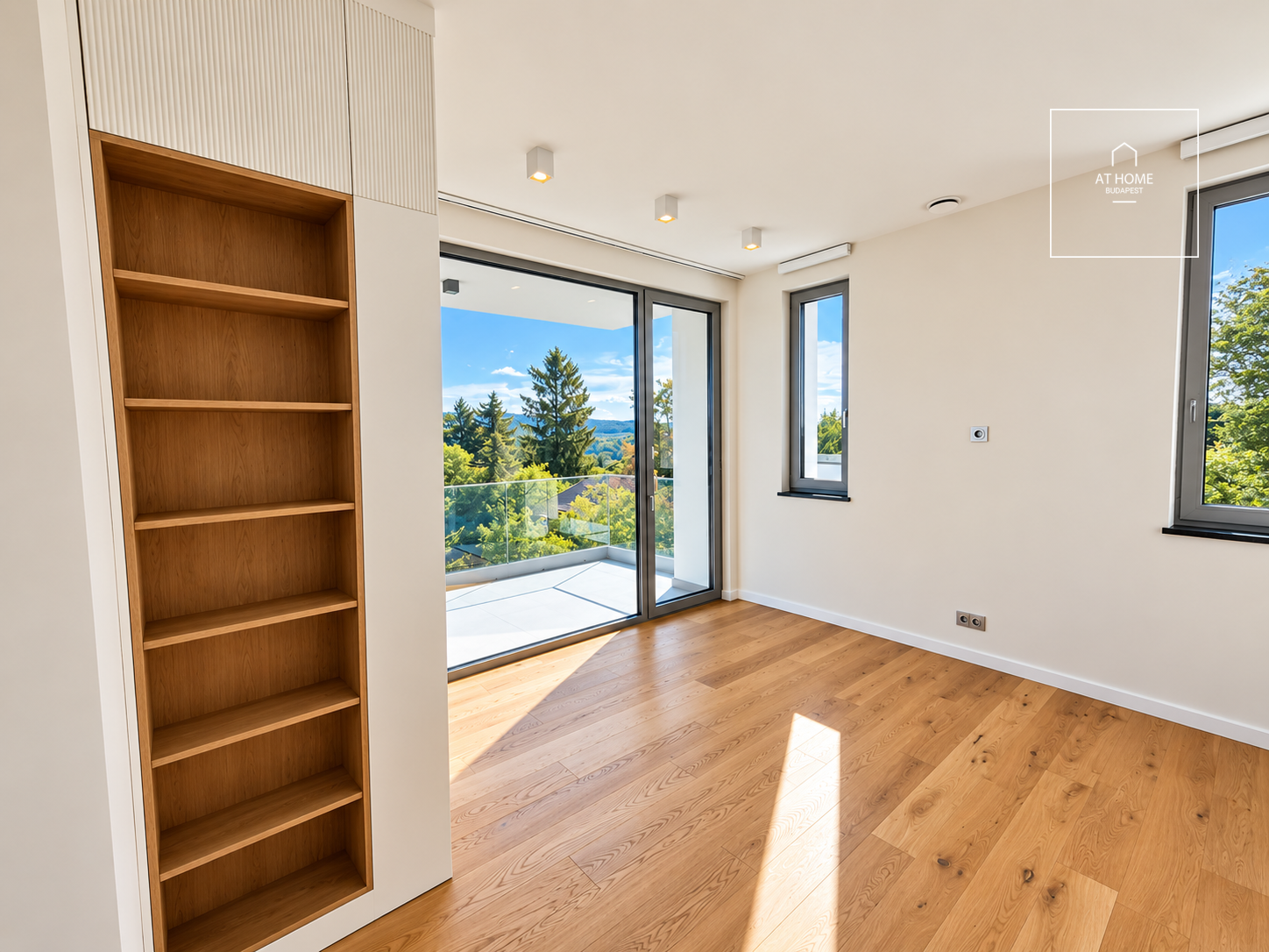 NEW-BUILD, ENERGY-EFFICIENT FAMILY HOME WITH A FOUR-CAR GARAGE, BORDERING NATURE